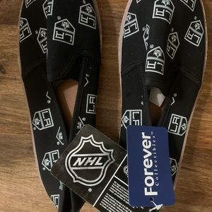Women’s L large black slip on hockey sports NHL